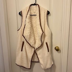 Brand new, never worn. Medium fleece, cream color vest